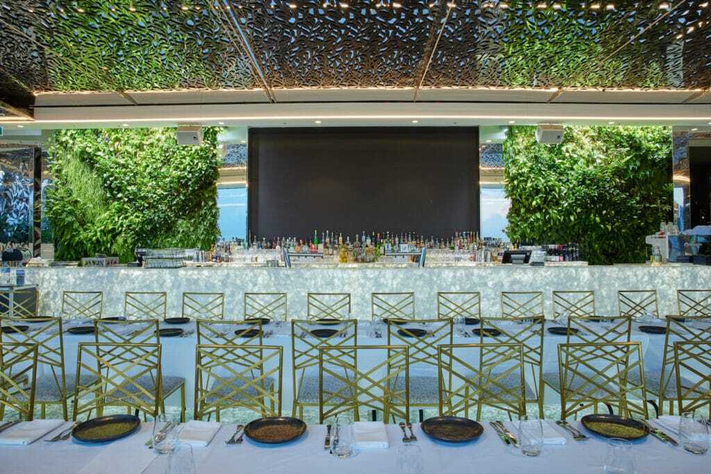 The green walls and table set up at Emporium South Bank Brisbane's The Terrace rooftop restaurant and bar. Maintained by Advance Plants