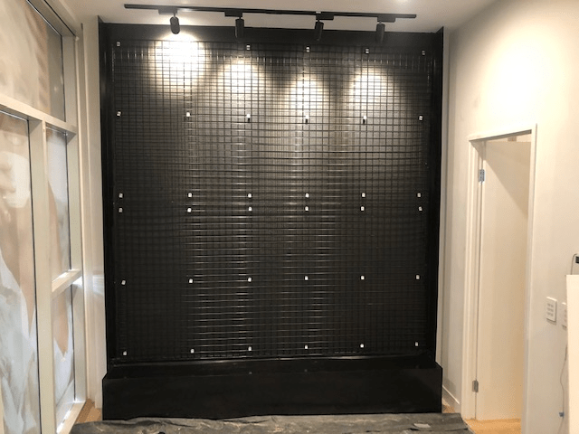 Wall frame mesh and trough, prepped for green wall installation