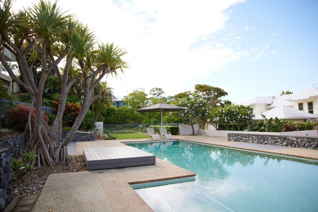 The outdoor pool area at Badon Village RACV Royal Pines Resort on the Gold Coast.