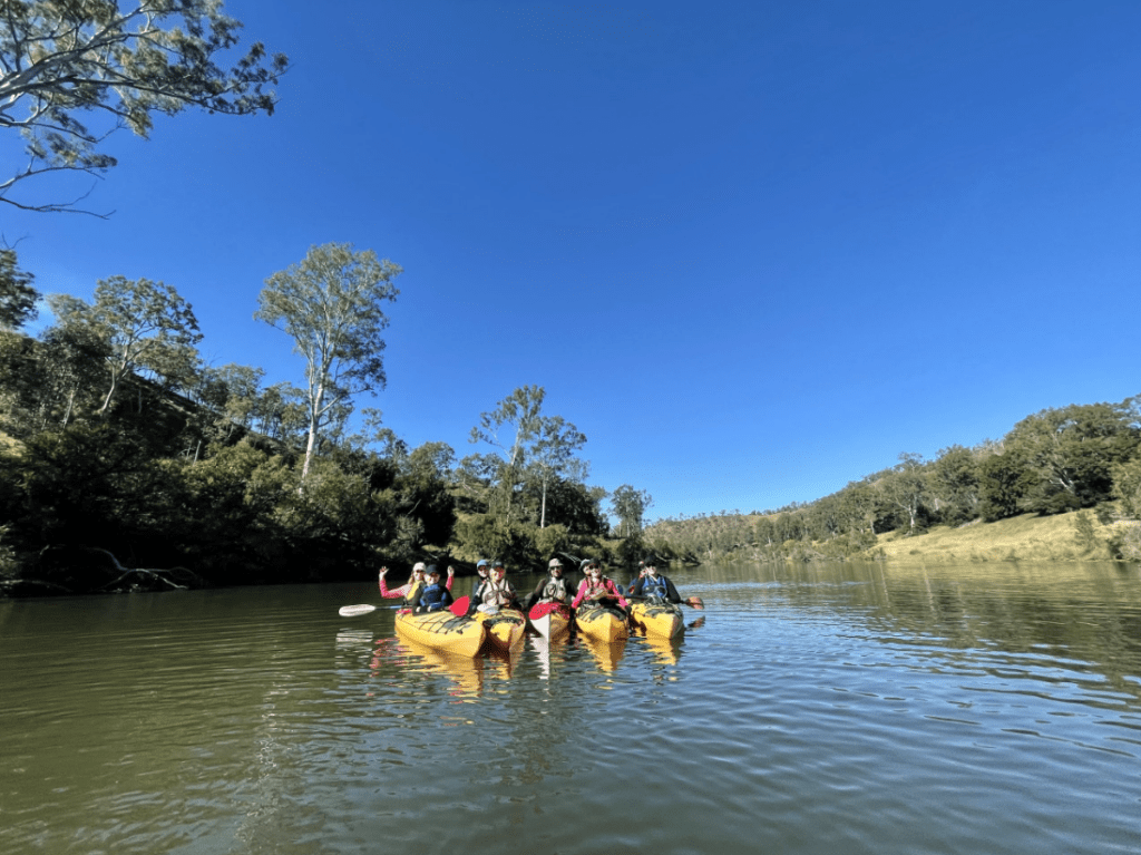 Advance Plants in kayaks on a team retreat
