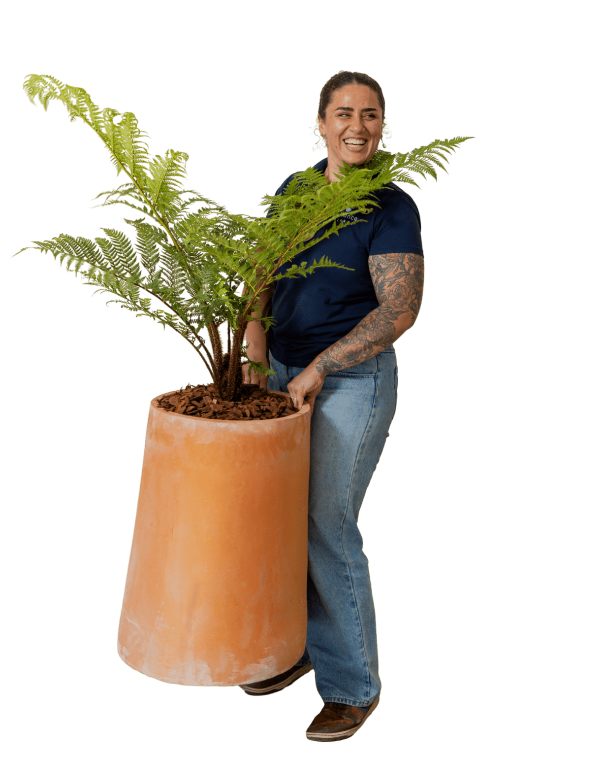 Advance Plants team member with a fern