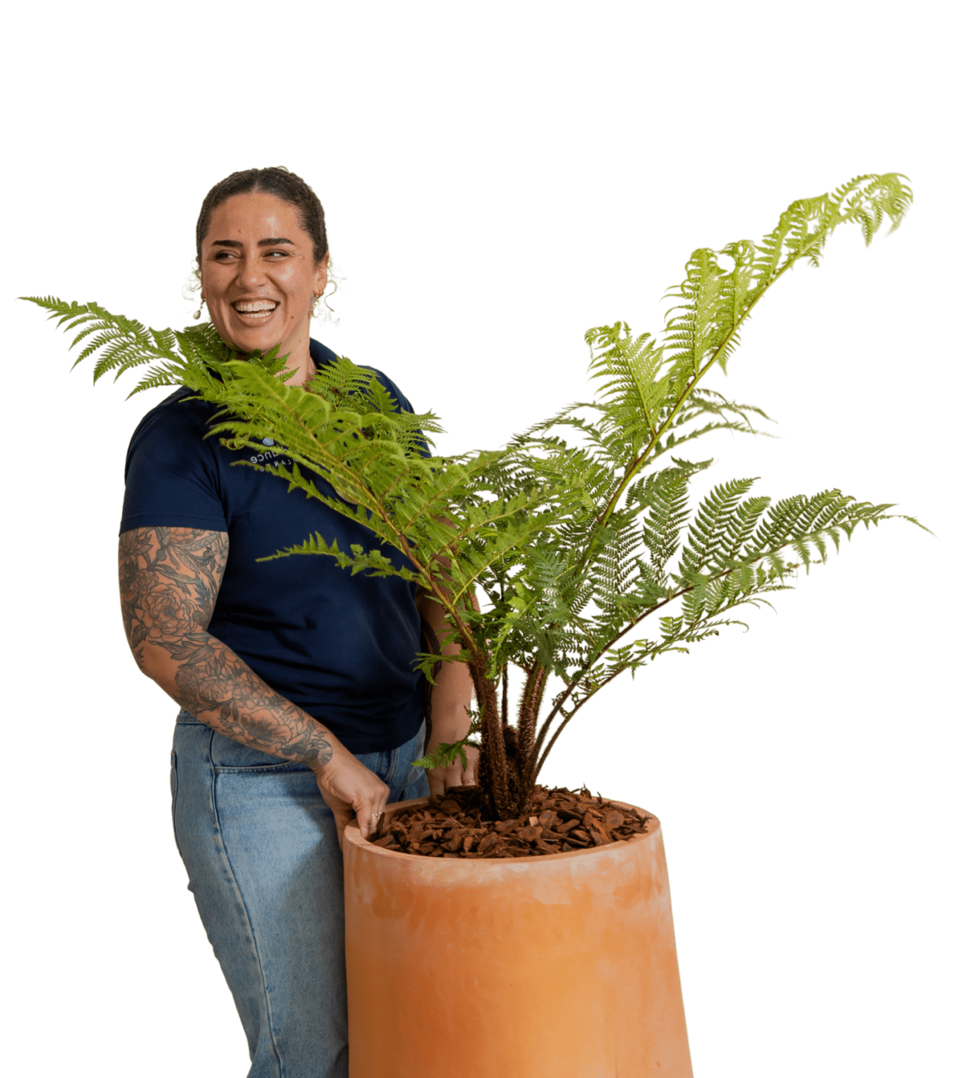 Advance Plants team member with a fern